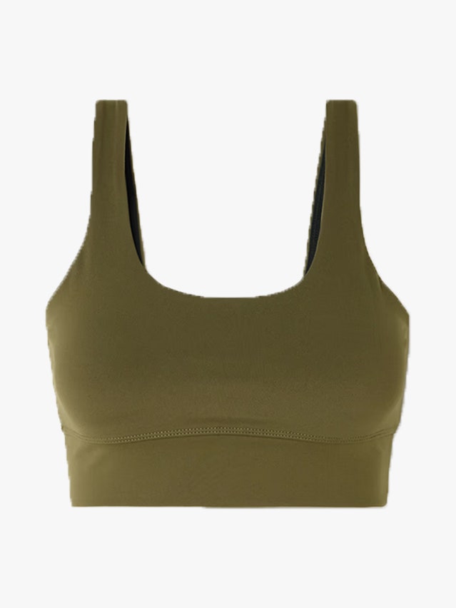 Image may contain: Cushion, Home Decor, Clothing, Vest, Bra, Lingerie, Underwear, Tank Top, and Smoke Pipe